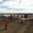 The weekend of June 20th, 2014, an intergenerational gathering brought together children, guardians, teachers and land defenders at PR Springs, site of the nation’s first commercial fuel tar sands strip […]
